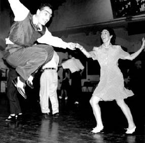 https://ukswingdance.files.wordpress.com/2011/11/swing-dance.jpg